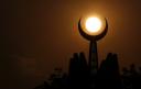 Symbolizing the faith of Islam, the crescent moon is seen at sunset on top of the Faisal Mosque in Islamabad, Pakistan, Tuesday, Sept. 16, 2008.
